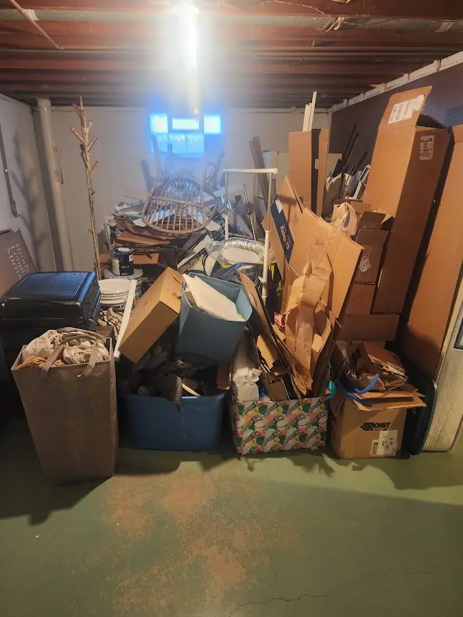 Roll-off dumpster container at job site for 15 Yard Dumpster Rental in Havre